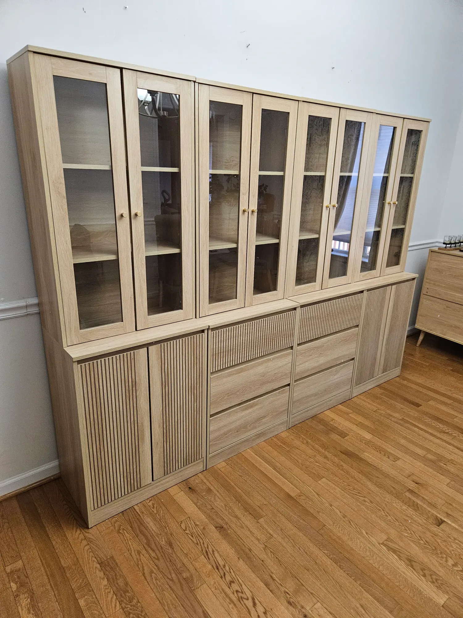 elite-home-services-nc-furniture-assembly-glass-door-cabinet-completed.webp