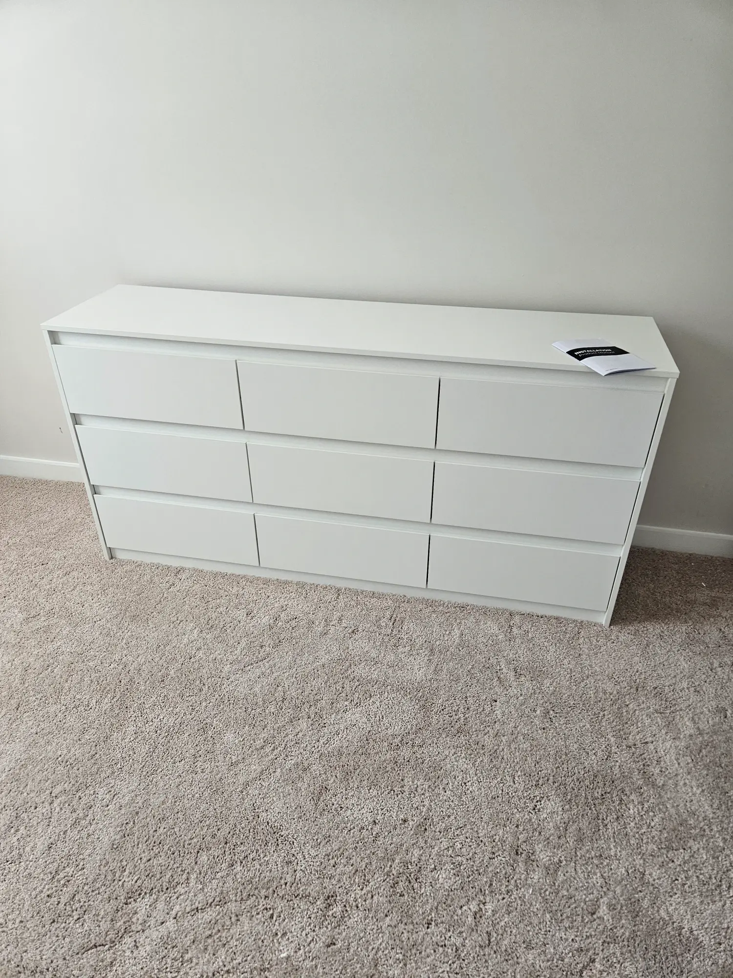elite-home-services-nc-furniture-assembly-white-9-drawer-dresser.webp