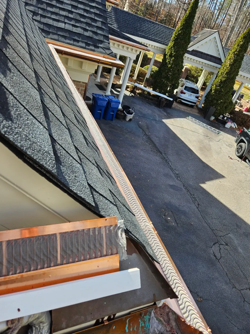 elite-home-services-nc-copper-gutter-guard-driveway-gazebo.webp