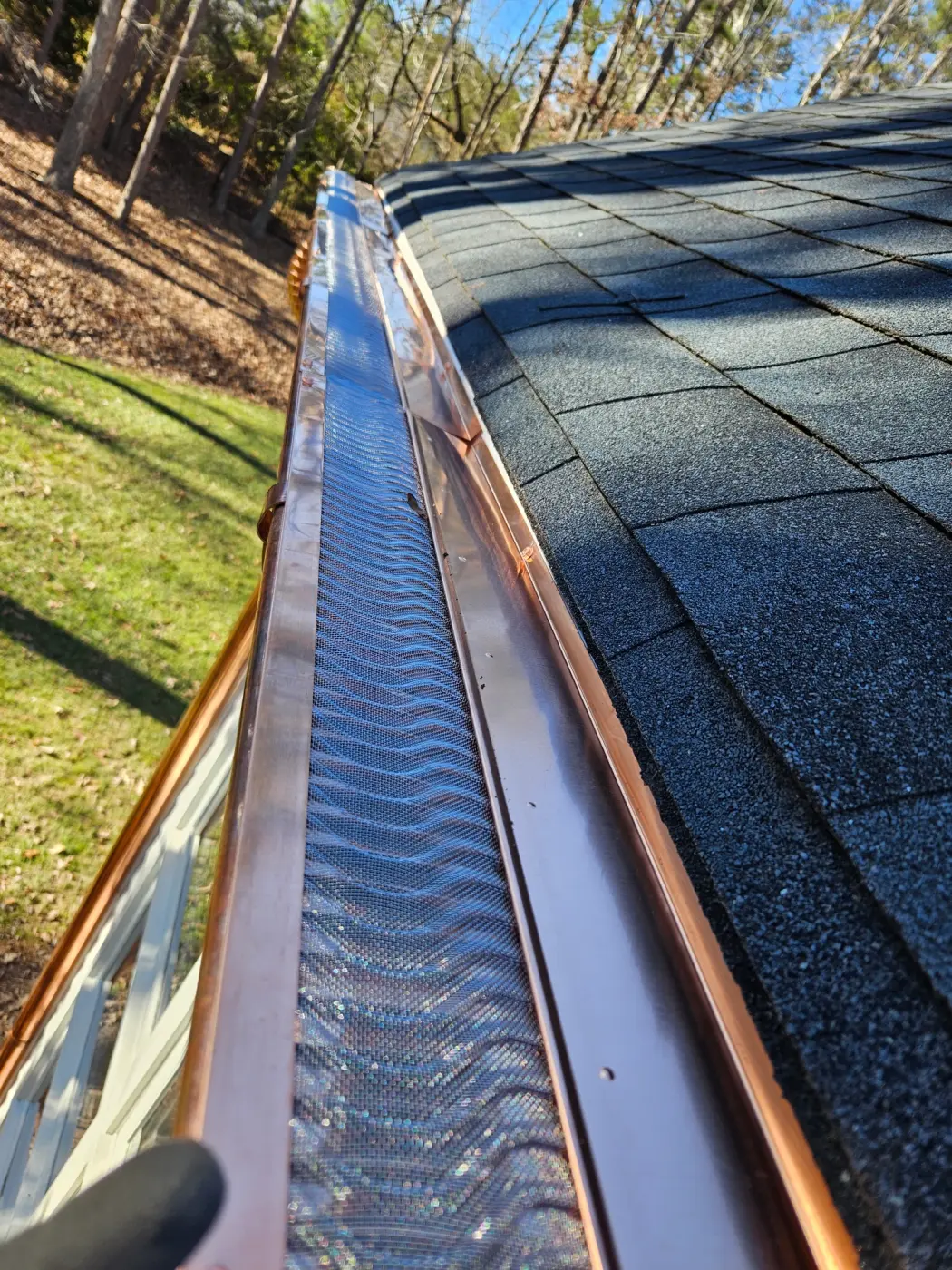 elite-home-services-nc-copper-gutter-guard-long-run-installed.webp