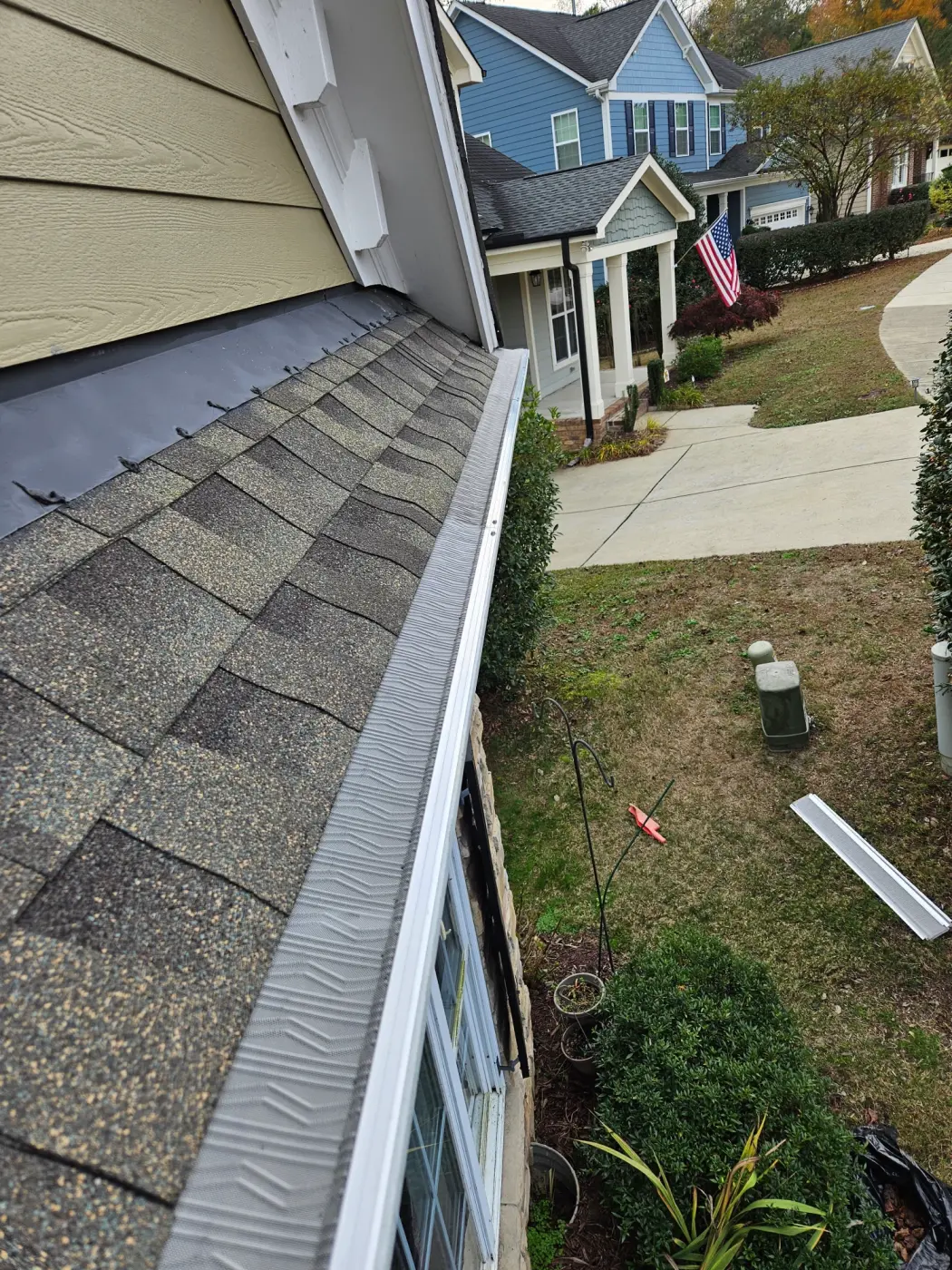 elite-home-services-nc-gutter-guard-installed-front-neighborhood.webp
