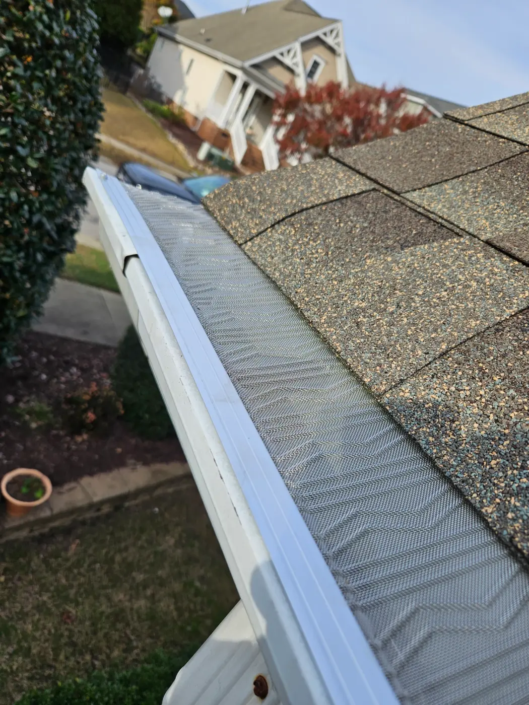 elite-home-services-nc-gutter-guard-mesh-screen-closeup.webp