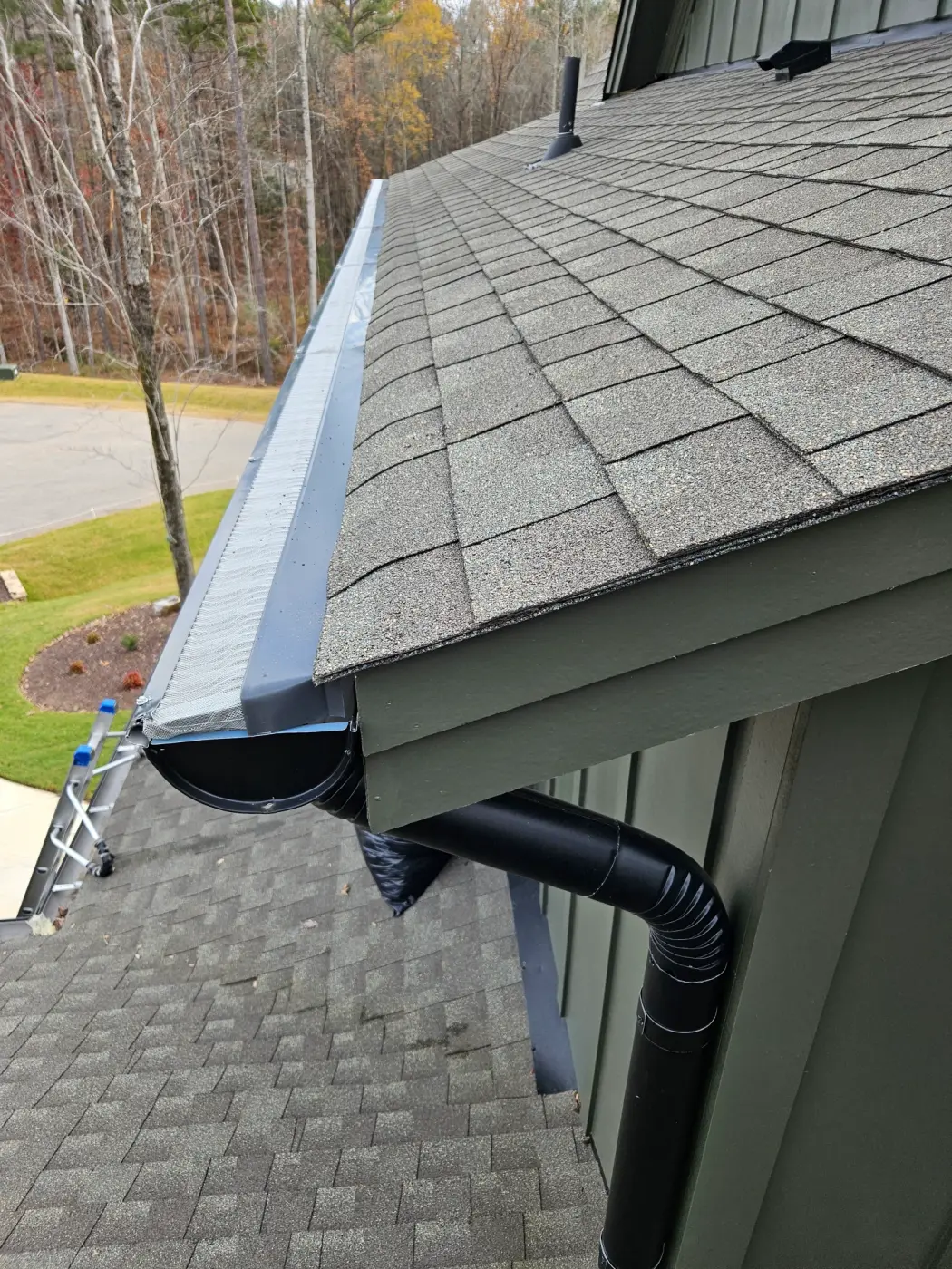elite-home-services-nc-half-round-gutter-downspout-corner.webp