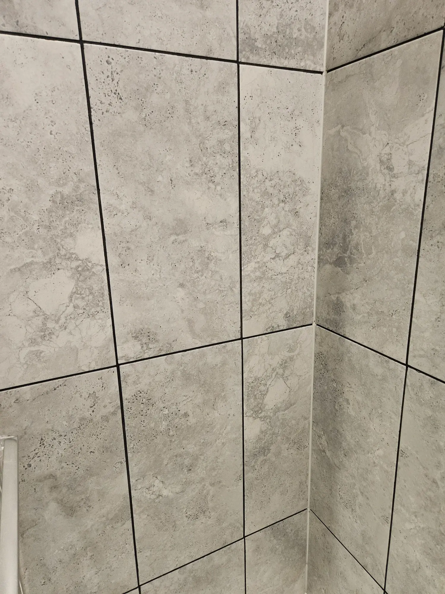 elite-home-services-nc-bathroom-shower-tile-corner-detail.webp