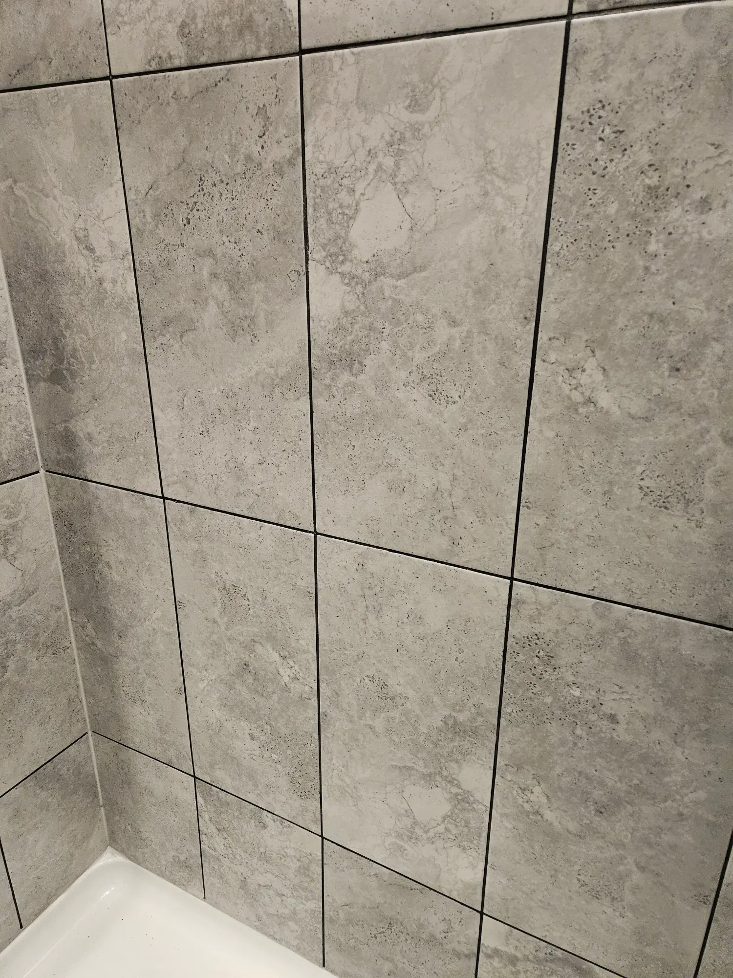 elite-home-services-nc-bathroom-shower-tile-wall-grout.webp