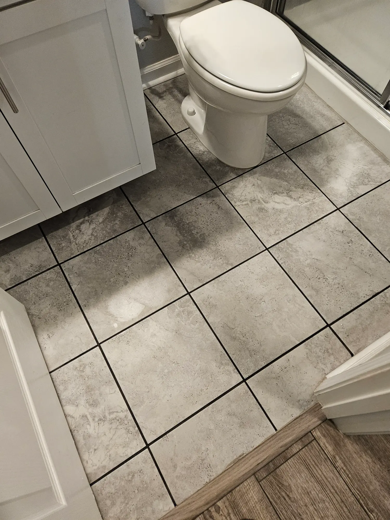 elite-home-services-nc-bathroom-tile-floor-vanity-remodel.webp