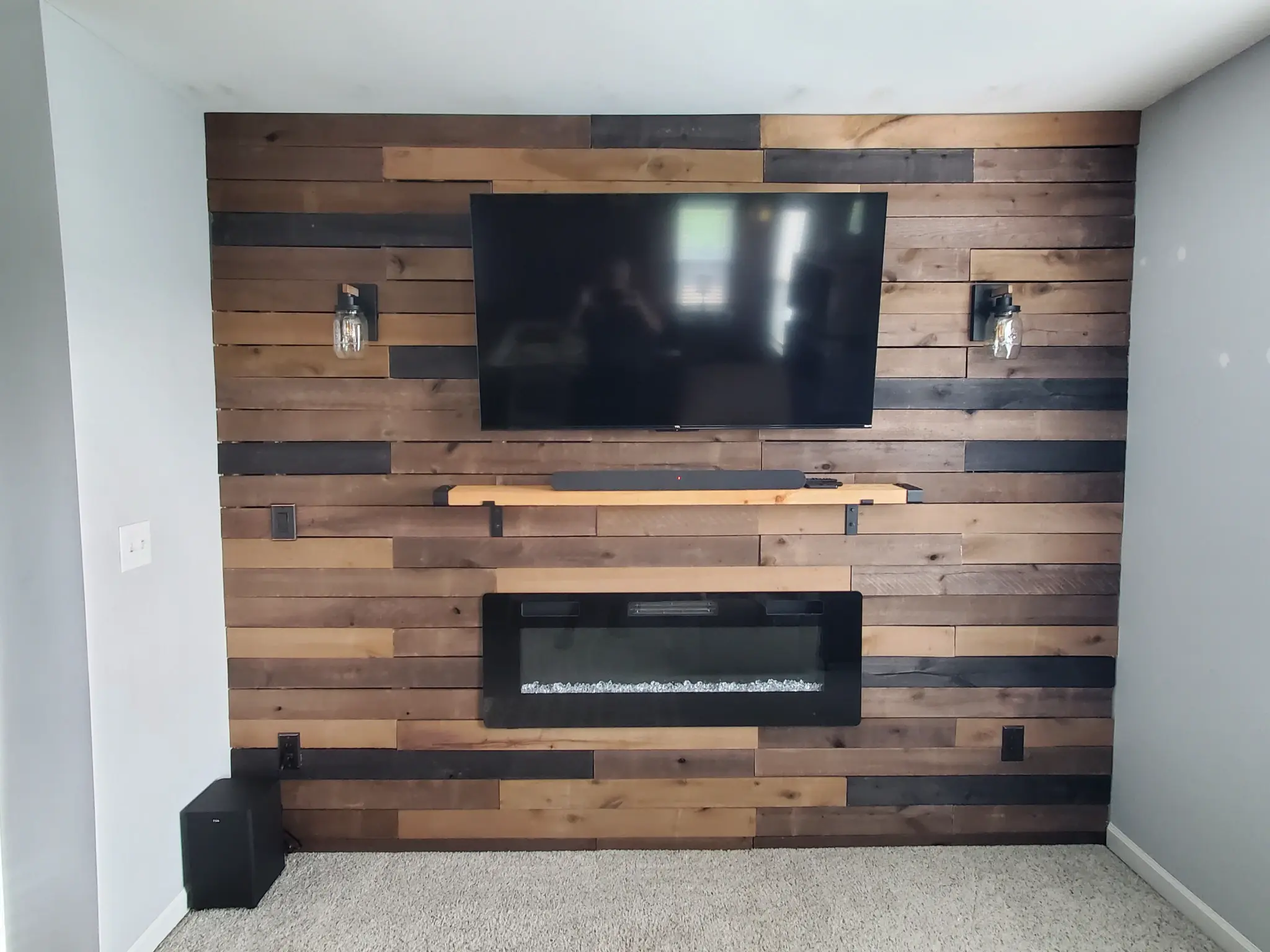 elite-home-services-nc-reclaimed-wood-accent-wall-tv-mount-electric-fireplace.webp