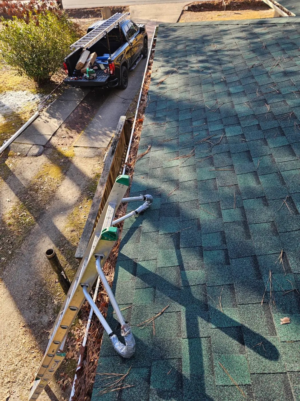 elite-home-services-nc-gutter-cleaning-debris-leaf-removal.webp