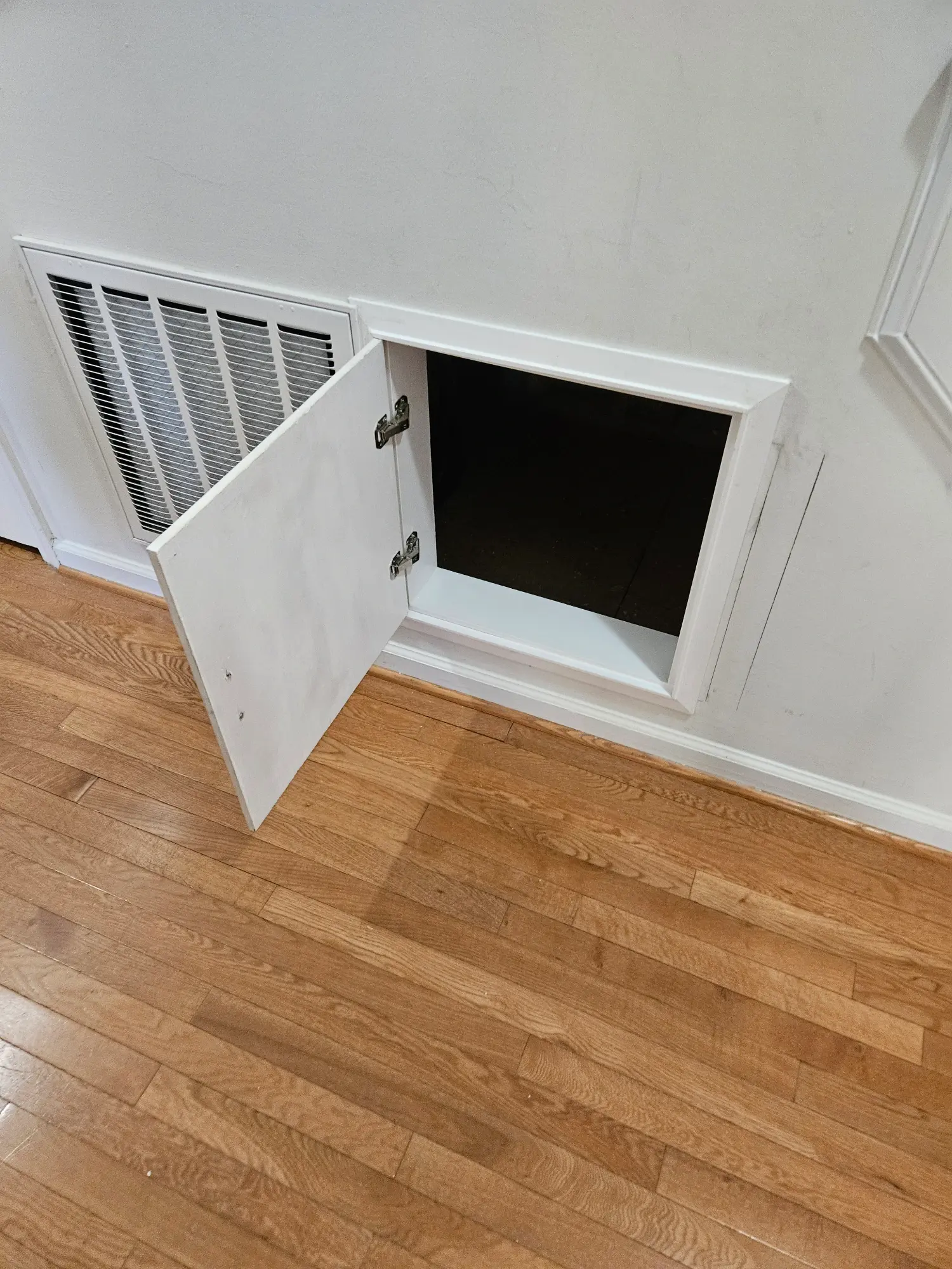 elite-home-services-nc-hvac-filter-access-panel-open.webp