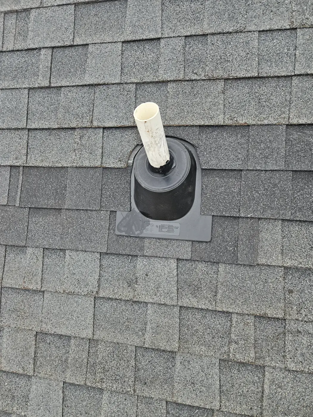 elite-home-services-nc-roof-plumbing-vent-pipe-boot-gray-shingles.webp