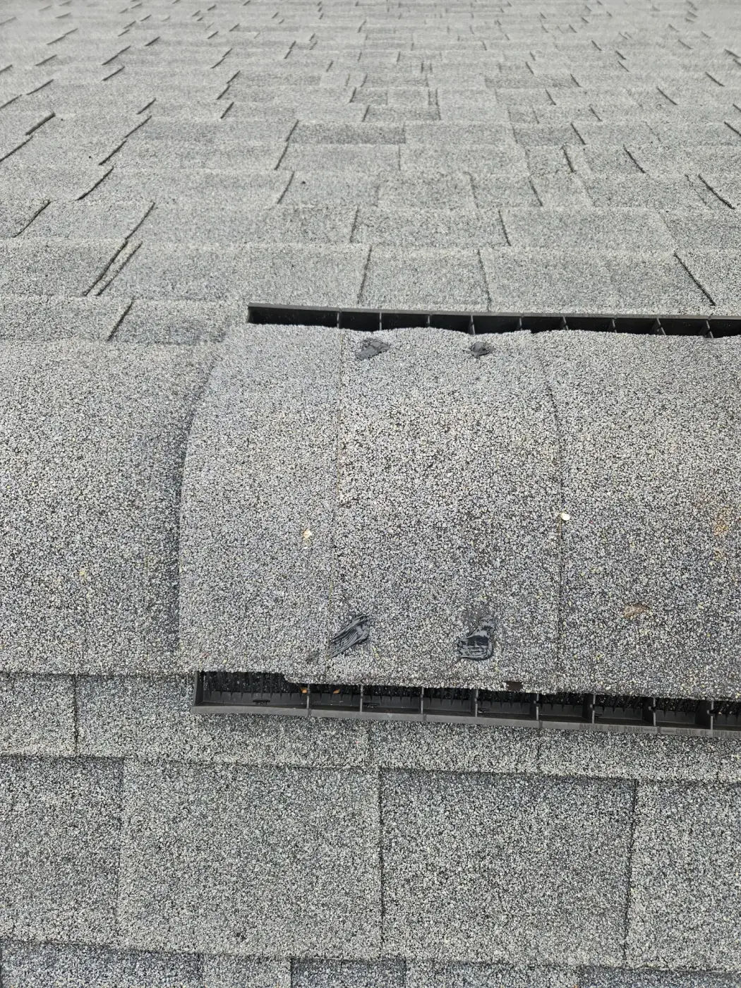 elite-home-services-nc-roof-ridge-vent-cap-shingle-repair.webp