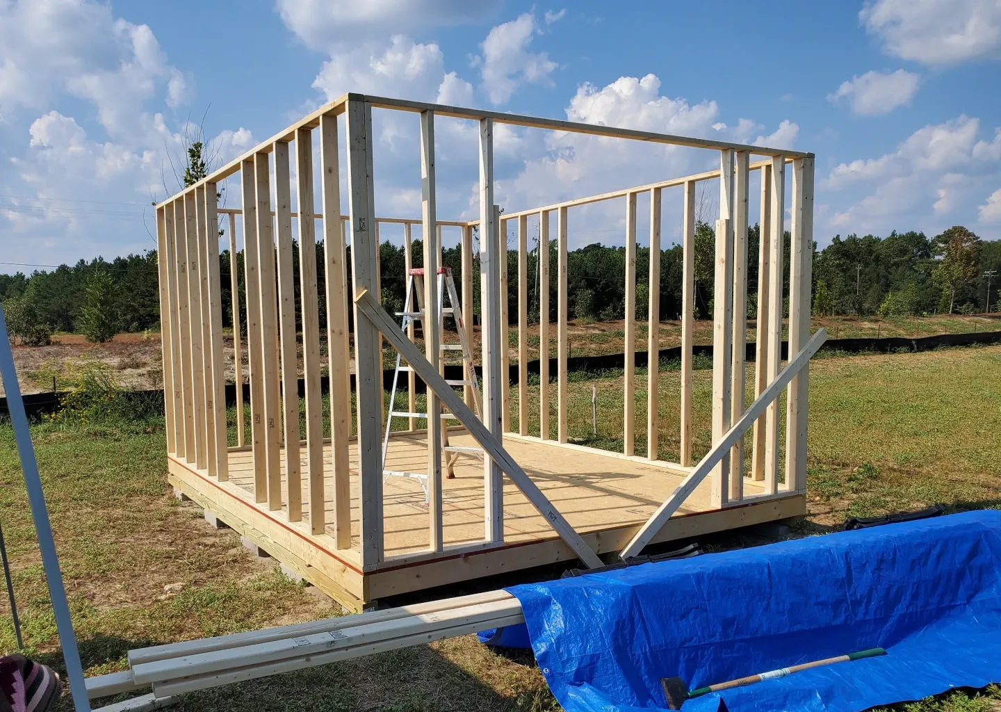 elite-home-services-nc-custom-shed-build-wall-framing-studs.webp